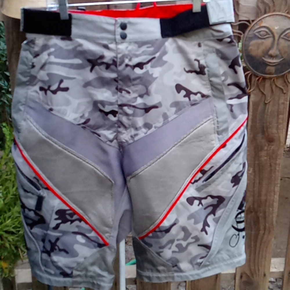 Men's bicycle apparel really good condition other than one stain I showed in the